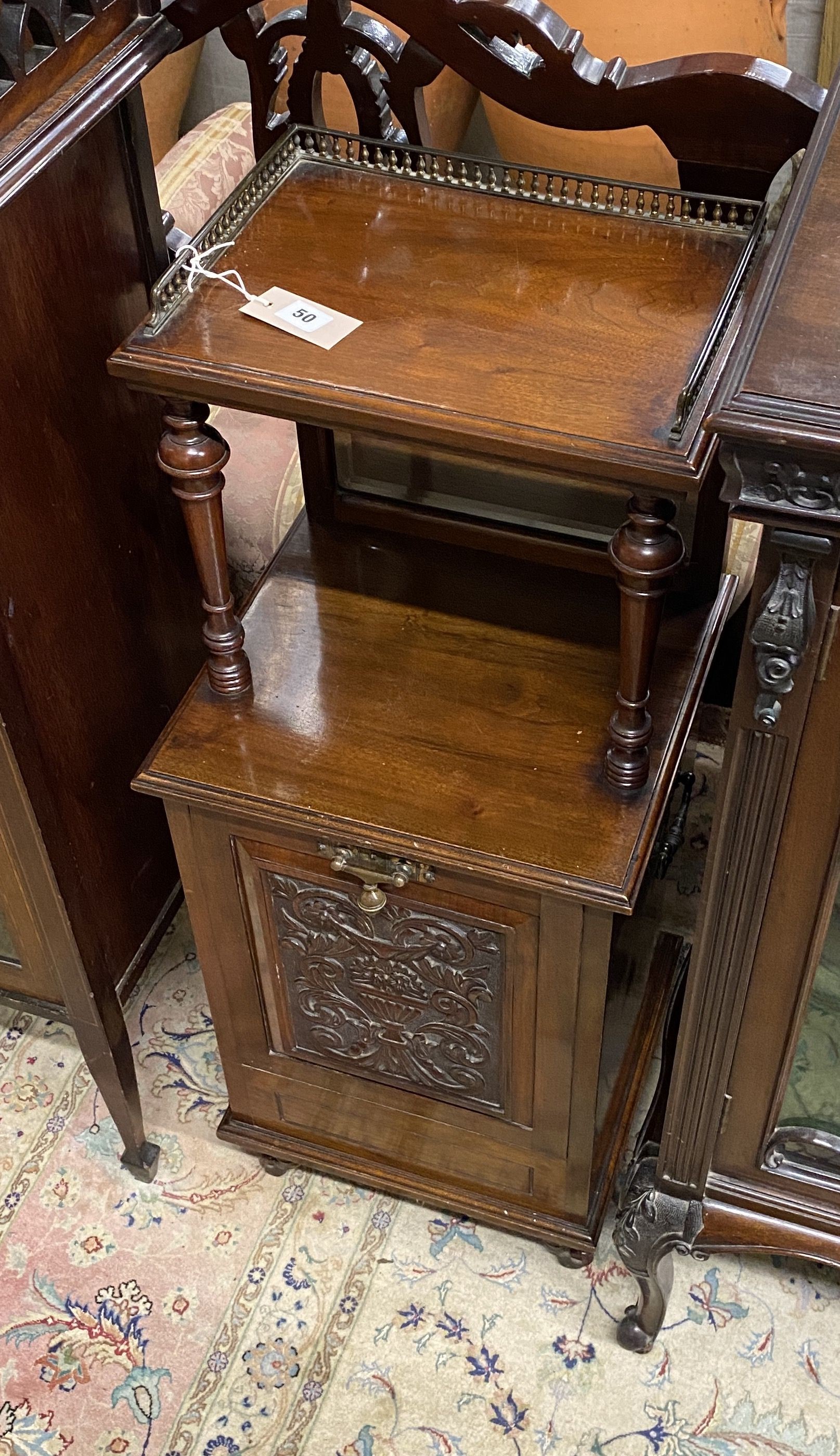 A Victorian carved walnut mirrored back coal purdonium, width 36cm, depth 35cm, height 96cm